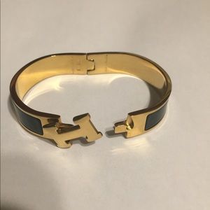 Hermès black and gold bracelet